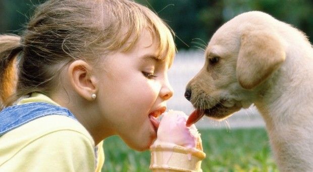 girl and puppy